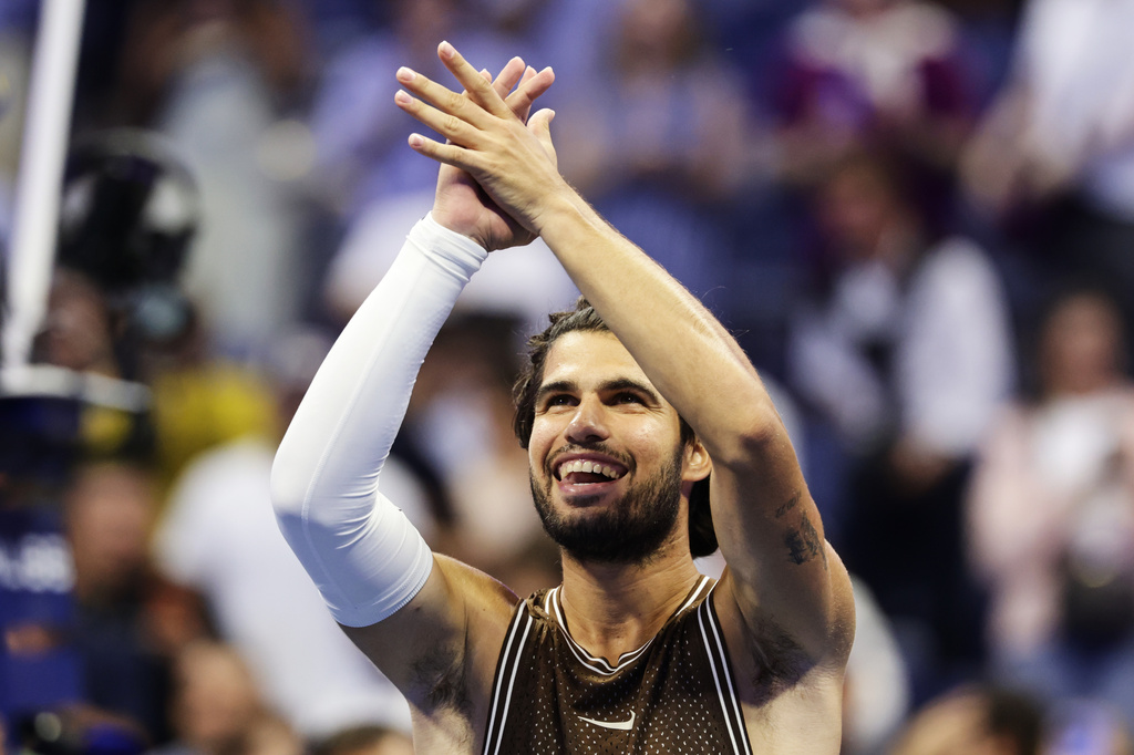 Carlos Alcaraz, of Spain, celebrates winning a match against Jaime Faria, of Portugal, during the second round of the U.S. Open tennis championships, Wednesday, Sept. 2, 2026, in New York. (AP Photo/Adam Hunger)