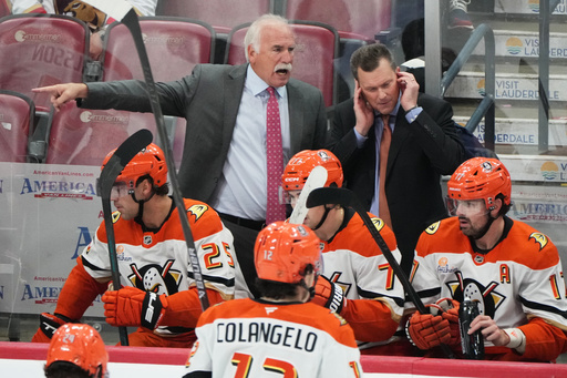 Anaheim Ducks head coach Joel Quenneville, left, calls a play during the third period of an NHL hockey game against the Florida Panthers, Tuesday, Oct. 28, 2025, in Sunrise, Fla. (AP Photo/Lynne Sladky) Anaheim Ducks head coach Joel Quenneville, left, calls a play during the third period of an NHL hockey game against the Florida Panthers, Tuesday, Oct. 28, 2025, in Sunrise, Fla. (AP Photo/Lynne Sladky)