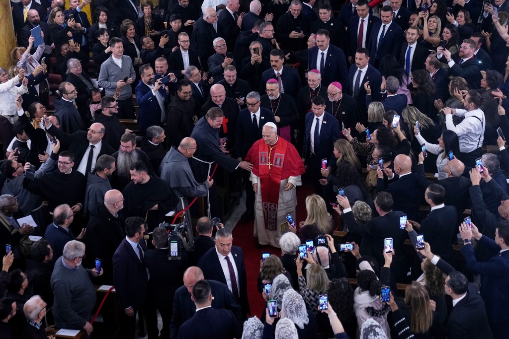 Pope Leo XIV arrives for a meeting with the clergy at the Cathedral of the Holy Spirit, in Istanbul, Turkey, Friday, Nov. 28, 2025. (AP Photo/Domenico Stinellis)
