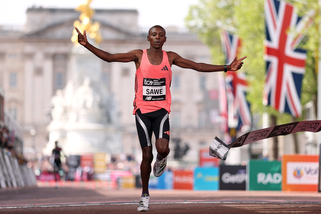 Sebastian Sawe from Kenya crosses the finish line to win the men's race at the London Marathon in London, Sunday, April 26, 2026.(AP Photo/Ian Walton)