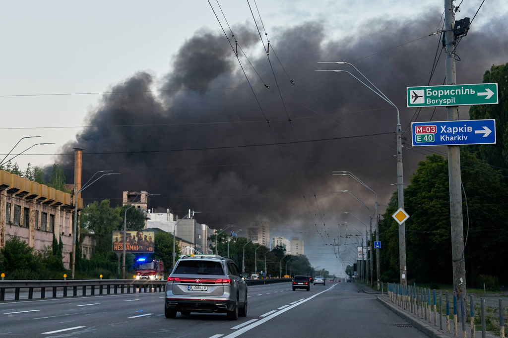 Smoke rises over the city after a Russian attack on Kyiv, Ukraine, Ukraine, Sunday, July 19, 2026. (AP Photo/Efrem Lukatsky)