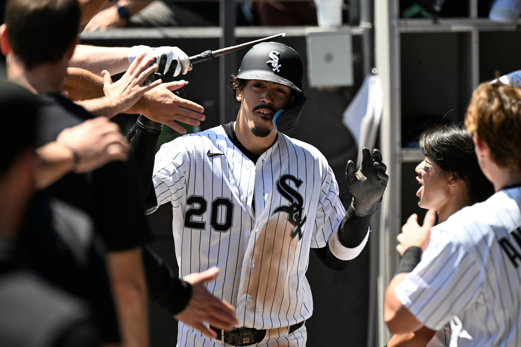 Chicago White Sox's Miguel Vargas celebrates in the dugout after scoring during the first inning of a baseball game against the Minnesota Twins, Thursday, May 28, 2026, in Chicago. (AP Photo/Matt Marton)
