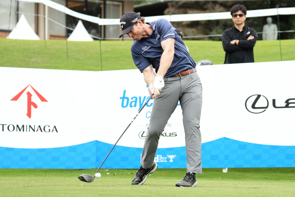 Max Greyserman of the U.S. tees off on the 17th hole during the first round of the Baycurrent Classic golf tournament at the Yokohama Country Club in Yokohama, near Tokyo, Thursday, Oct. 9, 2025. (AP Photo/Hiro Komae)