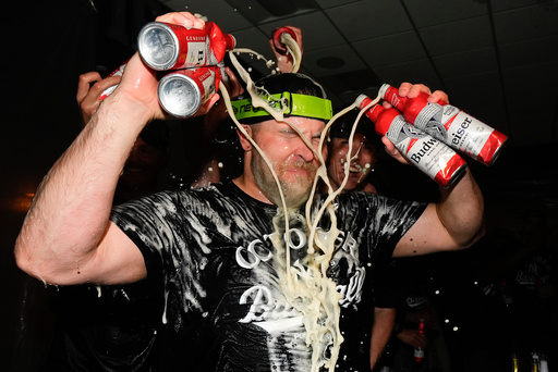 New York Yankees pitcher David Bednar (53) sprays himself with beer while celebrating with teammates after the Yankees defeated the Boston Red Sox in Game 3 of an American League wild-card baseball playoff series, Thursday, Oct. 2, 2025, in New York. (AP Photo/Yuki Iwamura) New York Yankees pitcher David Bednar (53) sprays himself with beer while celebrating with teammates after the Yankees defeated the Boston Red Sox in Game 3 of an American League wild-card baseball playoff series, Thursday, Oct. 2, 2025, in New York. (AP Photo/Yuki Iwamura)