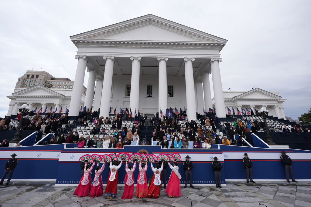 Gov. Abigail Spanberger attends an inaugural ceremony with her family after she was sworn in as Virginia's first female governor, at the Capitol in Richmond Va., Saturday, Jan. 17, 2026.(AP Photo/Stephanie Scarbrough)