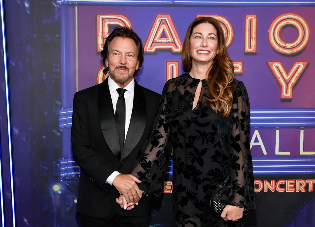 FILE - Eddie Vedder, left, and his wife Jill Vedder appear at the SNL50: The Homecoming Concert in New York on Feb. 14, 2025, (Photo by Evan Agostini/Invision/AP, File)