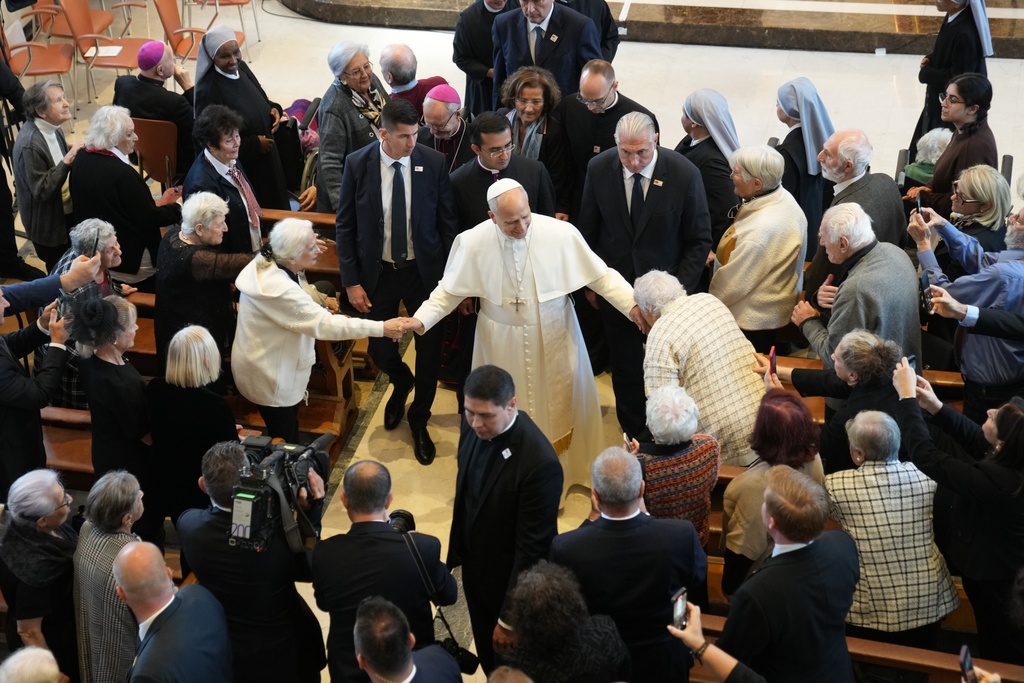 Pope Leo XIV visits the nursing home of the Little Sisters of the Poor, in Istanbul, Turkey, Friday, Nov. 28, 2025. (AP Photo/Domenico Stinellis)