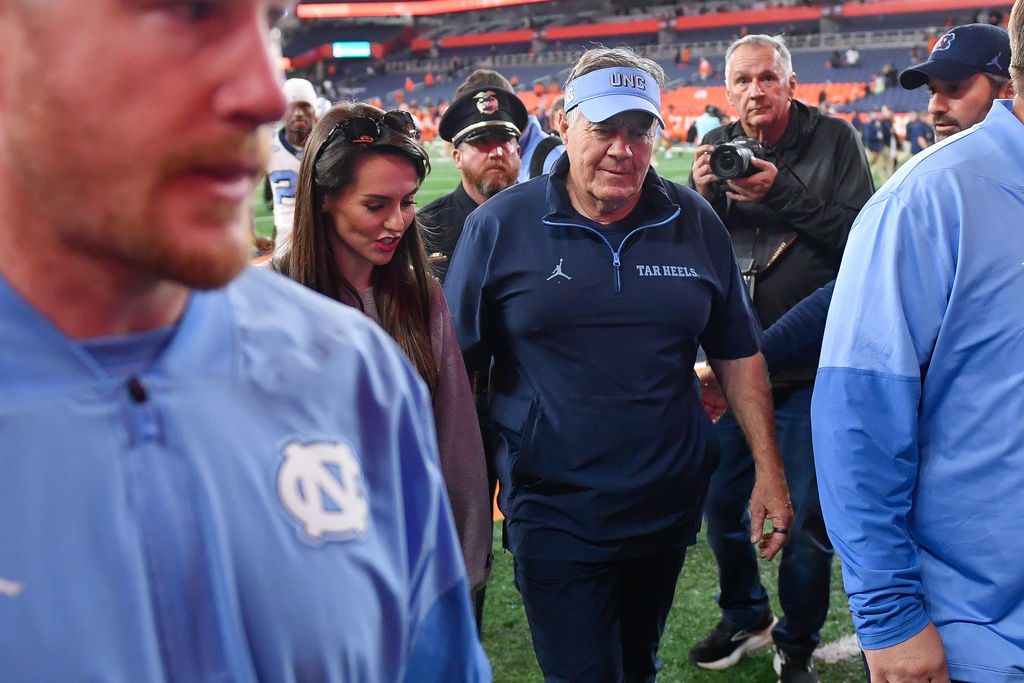 North Carolina head coach Bill Belichick walks off the field after an NCAA college football game against Syracuse, Friday, Oct. 31, 2025, in Syracuse, N.Y. (AP Photo/Adrian Kraus)