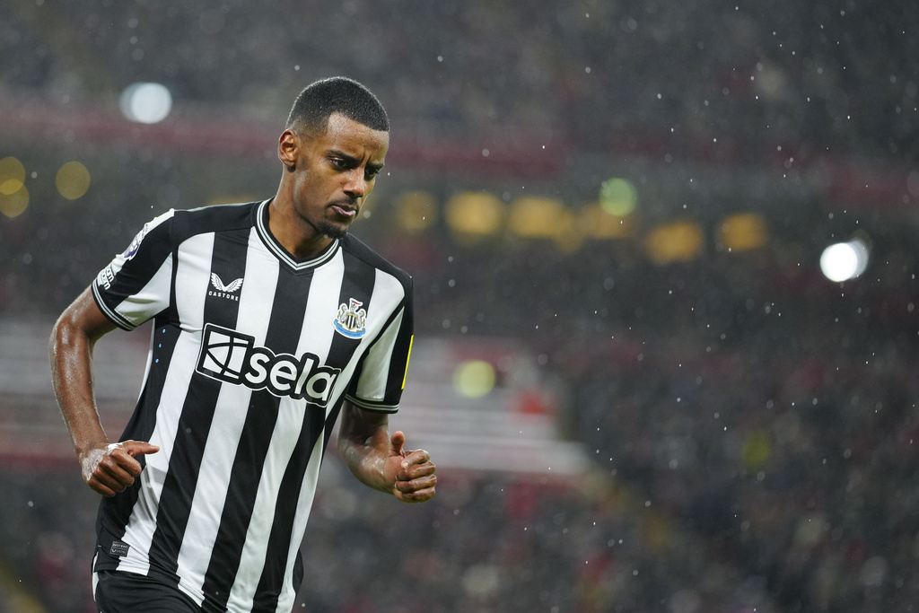 FILE - Newcastle's Alexander Isak celebrates after scoring his side's opening goal during the English Premier League soccer match between Liverpool and Newcastle, at Anfield stadium in Liverpool, England, Monday, Jan. 1, 2024. (AP Photo/Jon Super, File)
