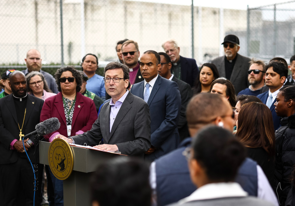 Gov. Bob Ferguson speaks during a news conference outside of the Northwest ICE Processing Center on Tuesday, April 28, 2026, in Tacoma, Wash. (Nick Wagner/The Seattle Times via AP)