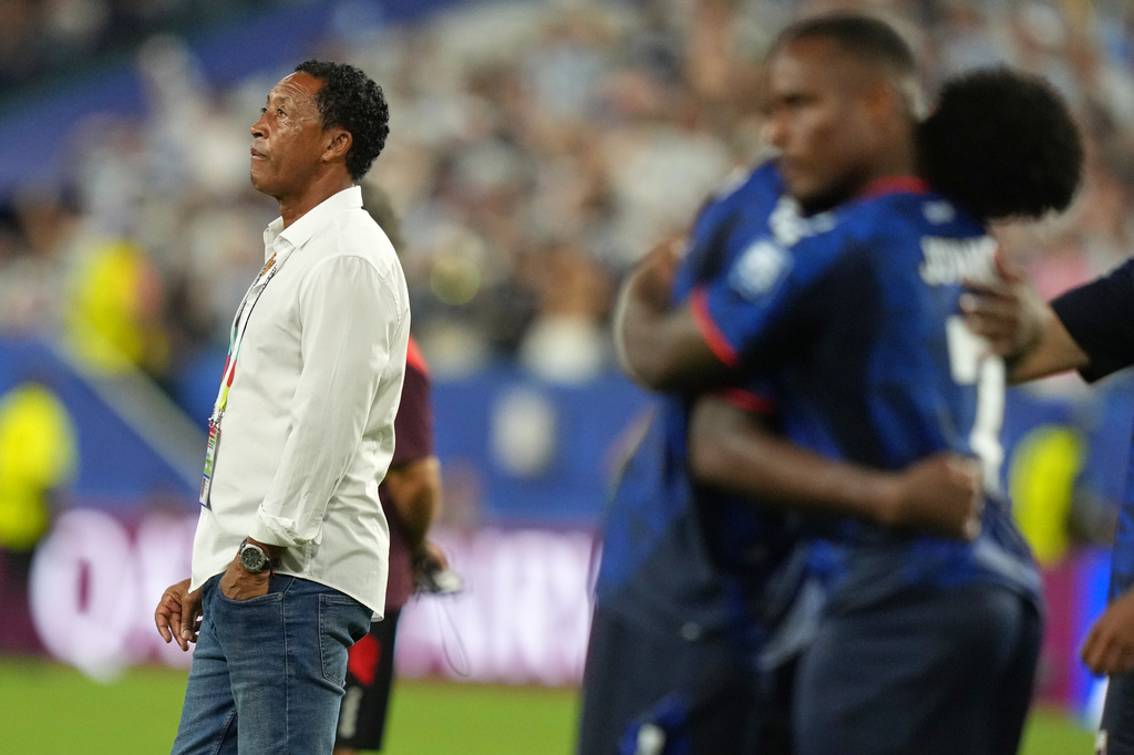 Cape Verde head coach Bubista stands on the pitch after the World Cup round of 32 soccer match between Argentina and Cape Verde in Miami Gardens, Fla., Friday, July 3, 2026. (AP Photo/Lynne Sladky)