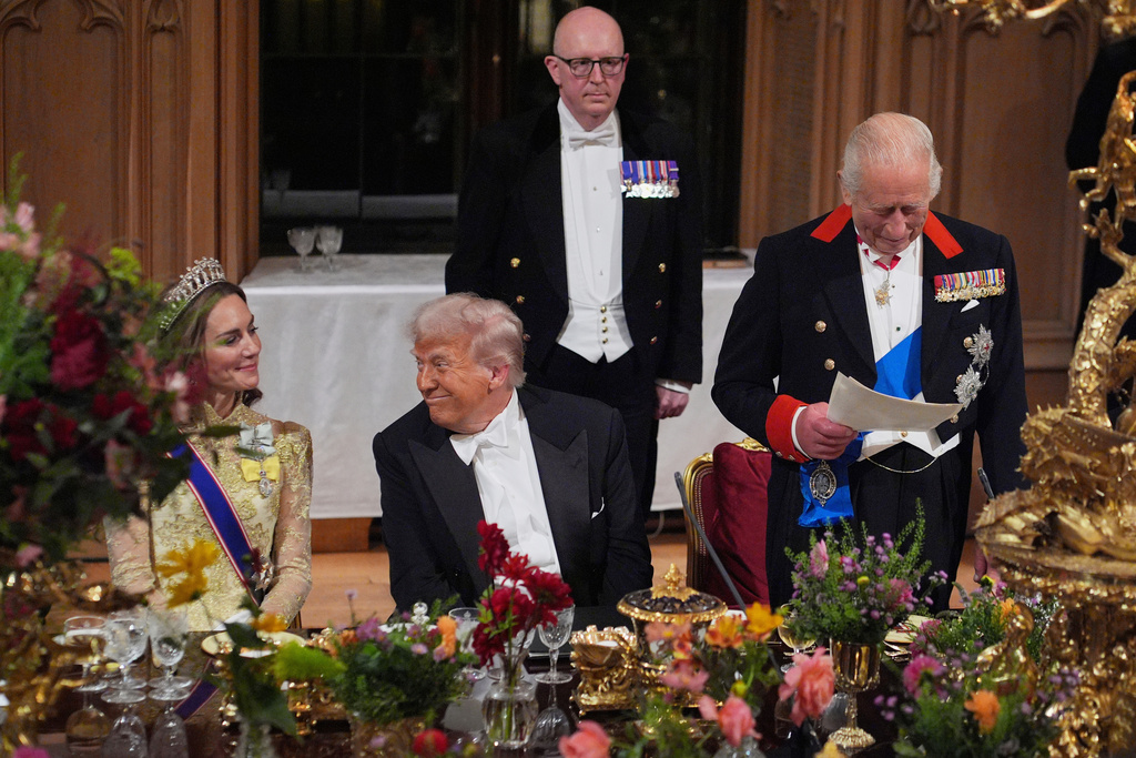 FILE - U.S. President Donald Trump, center, and Kate, Princess of Wales, listen to Britain's King Charles during the State Banquet in Windsor Castle, England, on day one of U.S. President Donald Trump and First Lady Melania Trump's second state visit to the U.K., Sept. 17, 2025. (Yui Mok/PA via AP, Pool Photo via AP, File)