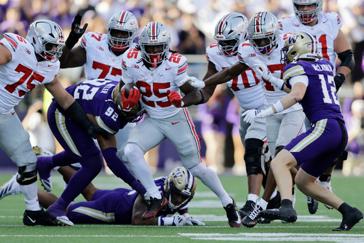 Ohio State running back Bo Jackson (25) carries the ball against the Washington during the second half of an NCAA college football game, Saturday, Sept. 27, 2025, in Seattle. (AP Photo/John Froschauer) Ohio State running back Bo Jackson (25) carries the ball against the Washington during the second half of an NCAA college football game, Saturday, Sept. 27, 2025, in Seattle. (AP Photo/John Froschauer)
