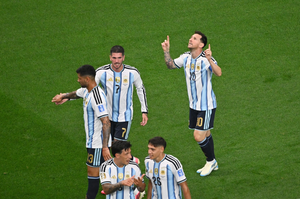 Argentina's Lionel Messi, right, celebrates scoring his side's opening goal during the World Cup Group J soccer match between Argentina and Austria in Arlington, Texas, near Dallas, Monday, June 22, 2026. (AP Photo/Jessica Tobias)