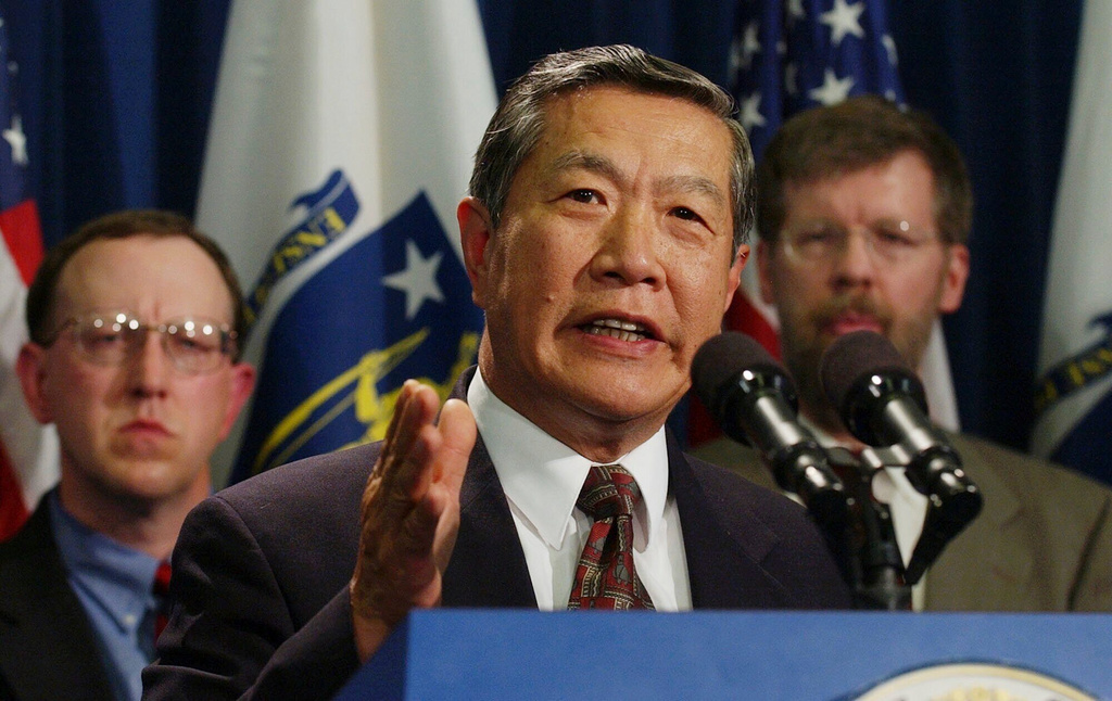 FILE - Forensic scientist Dr. Henry Lee faces reporters regarding the death penalty system at the Statehouse in Boston, May 3, 2004. (AP Photo/Charles Krupa, File)