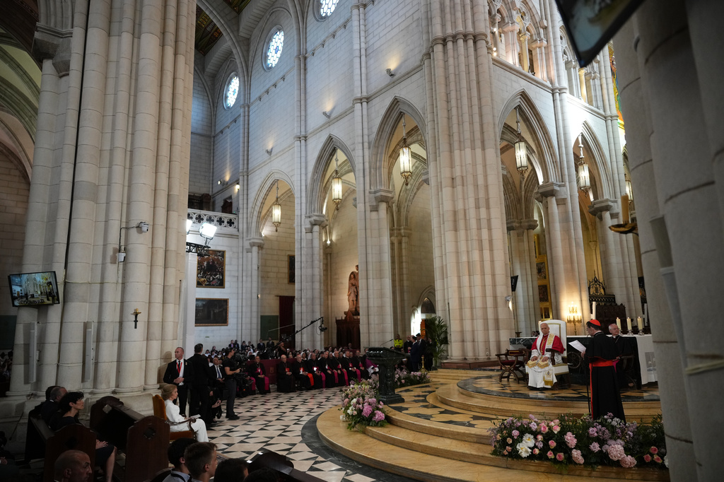 Pope Leo XIV, right, attends a prayer and devotion to our Lady of Almudena at the Cathedral of Holy Mary of Almudena in Madrid, Spain, Monday, June 8, 2026 (AP Photo/Alessandra Tarantino)
