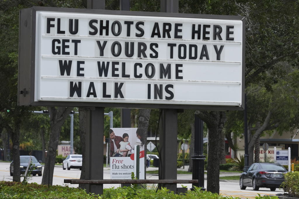 A sign at a Walgreens pharmacy offering flu shots is seen, Thursday, Sept. 4, 2025, in Miami Shores, Fla. (AP Photo/Marta Lavandier)