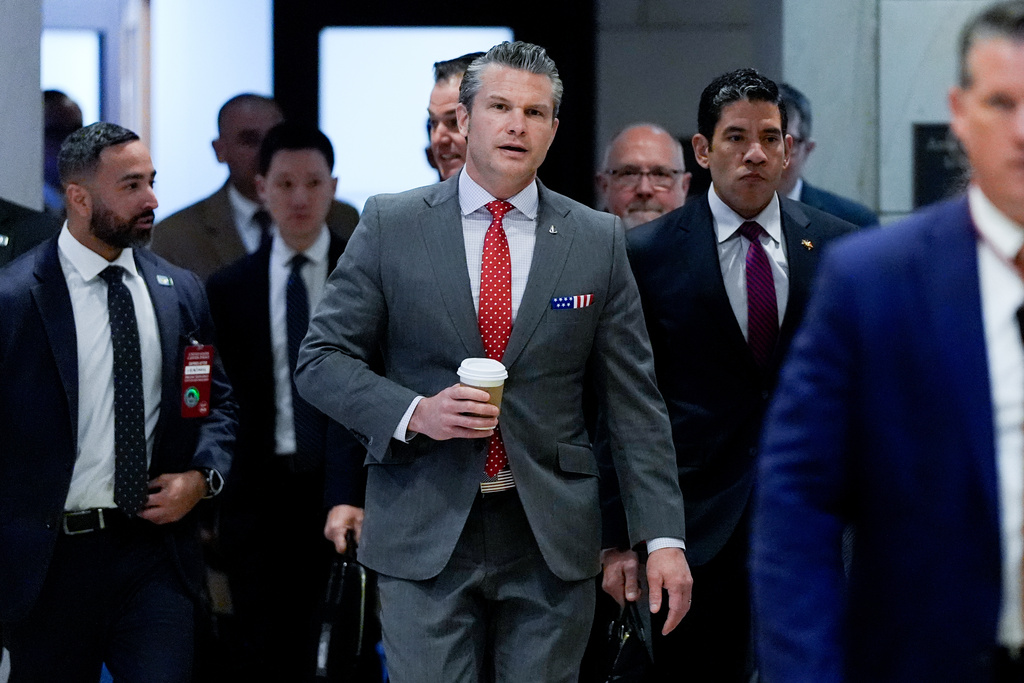 Defense Secretary Pete Hegseth arrives to brief members of Congress on military strikes near Venezuela, Tuesday, Dec. 16, 2025, at the Capitol in Washington. (AP Photo/Julia Demaree Nikhinson)