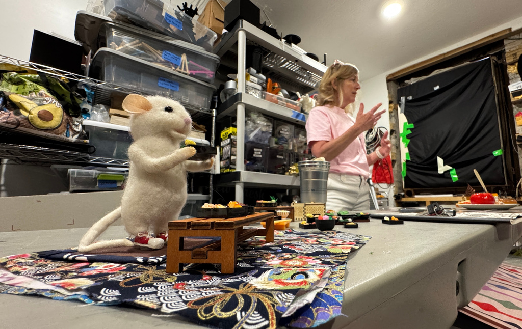 Vicki Taylor, the assistant curator of the Hattiesburg Pocket Museum, talks inside her workshop, in Hattiesburg, Miss., on Wednesday, March 25, 2026. (AP Photo/Sophie Bates)