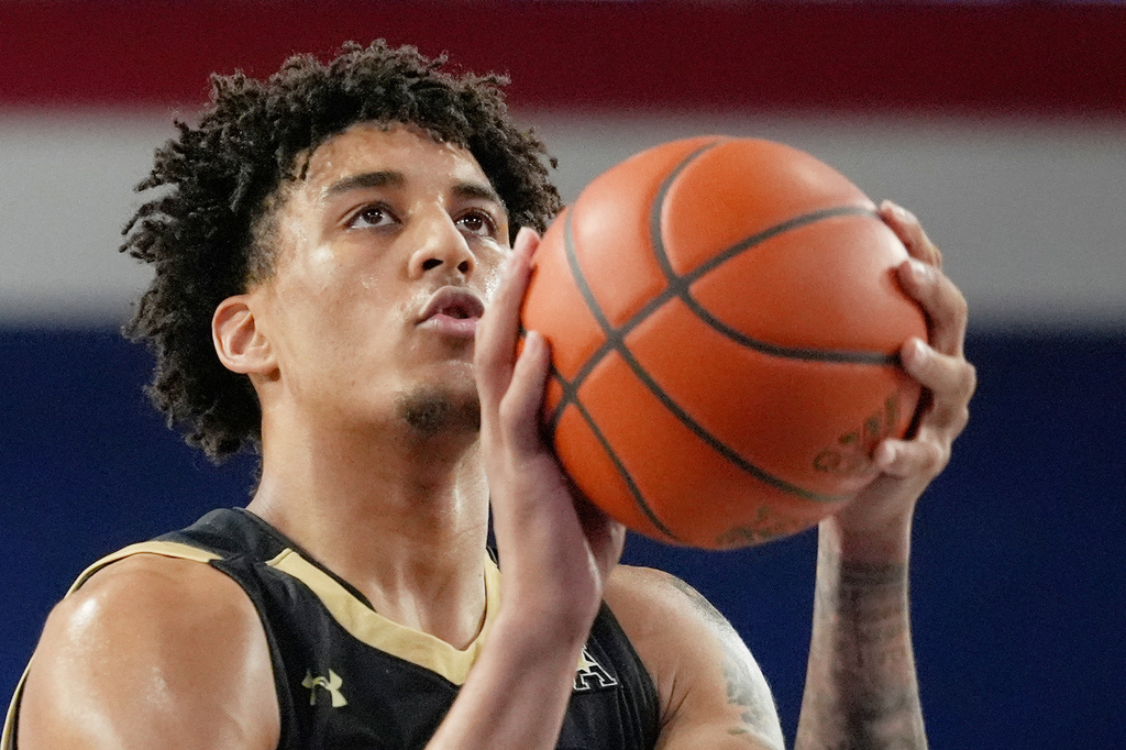 FILE - UAB forward Yaxel Lendeborg (3), who has since transferred to Michigan, aims a free throw shot during the second half of an NCAA college basketball game against Florida Atlantic , Sunday, Jan. 14, 2024, in Boca Raton, Fla. (AP Photo/Marta Lavandier)