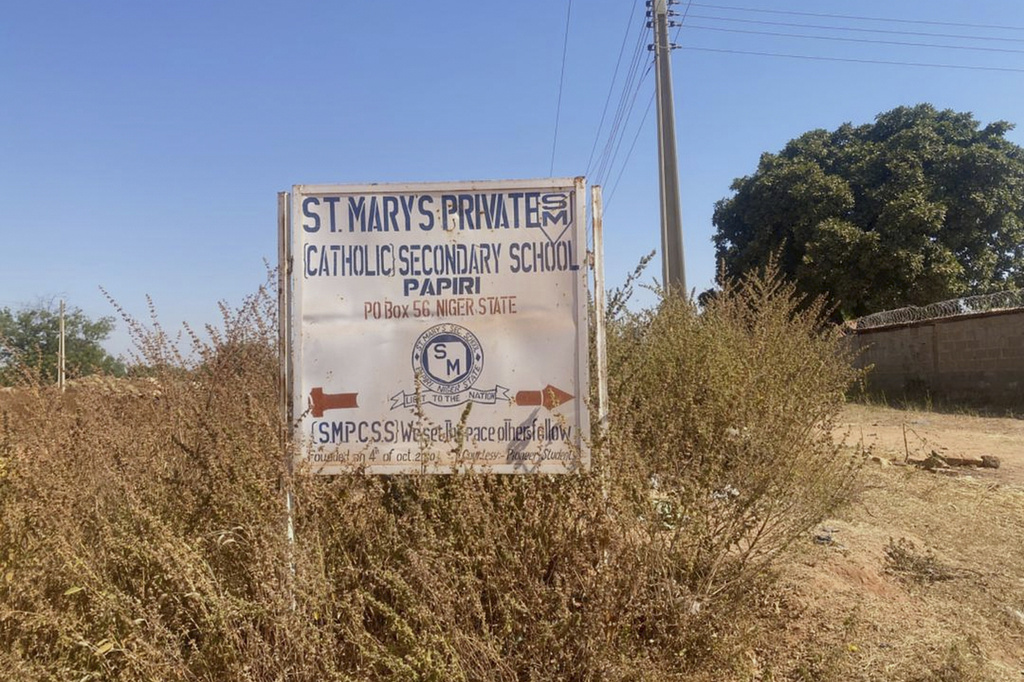 A sign of St. Mary's Catholic Primary and Secondary School, where gunmen on Friday abducted children and staff in Papiri community, Nigeria, Tuesday, Nov.25, 2025. (AP Photo/Yunusa Umar )