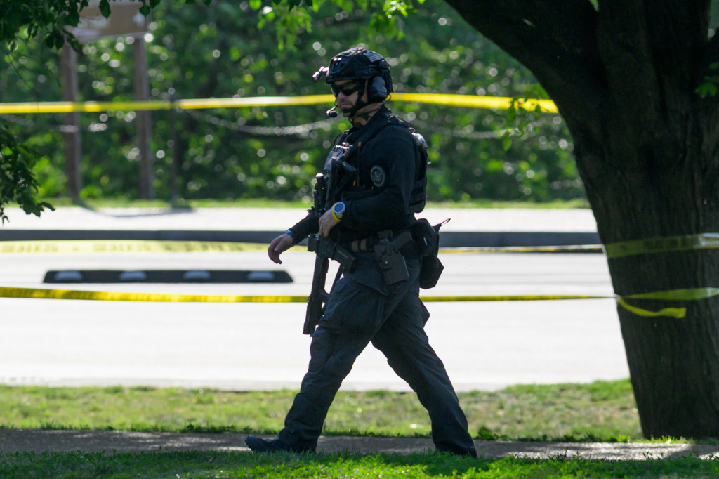 Police respond after a person was shot by law enforcement near the Washington Monument in Washington, Monday, May 4, 2026. (AP Photo/Rod Lamkey Jr.)