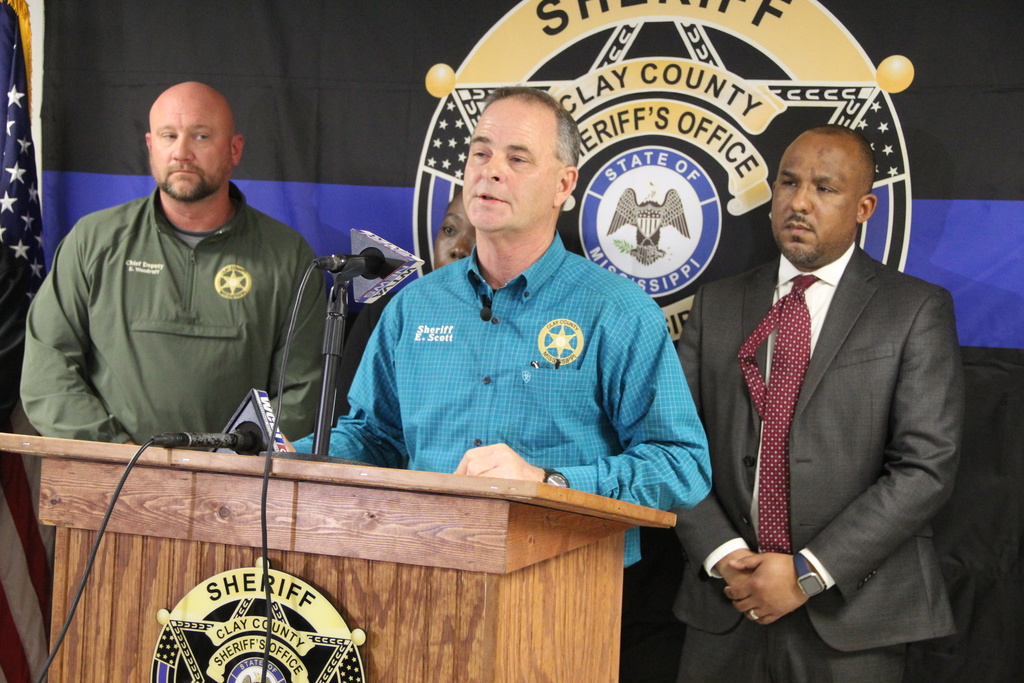 Clay County Sheriff Eddie Scott speaks during a news conference in West Point, Miss., on Saturday, Jan. 10, 2026, accompanied by Chief Deputy Steven "Woody" Woodruff, left, and Clay County District Attorney Scott Colom, right, after fatal Friday night shootings at three locations. (Braden Simmons/The Commercial Dispatch via AP)