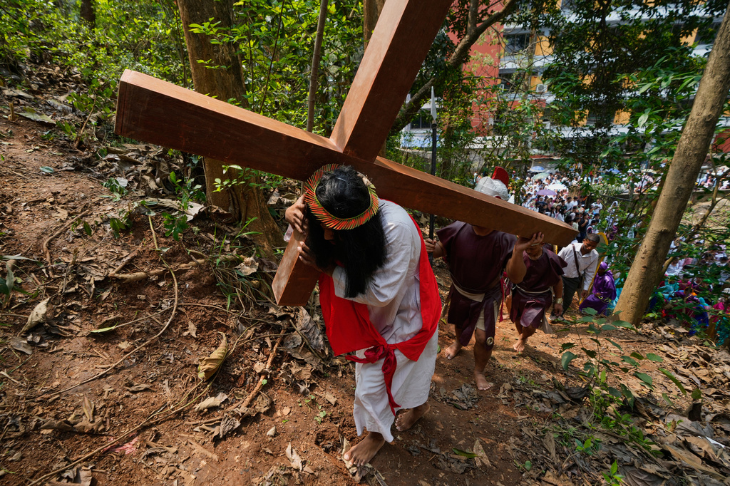 Christians reenact the crucifixion of Jesus Christ in Guwahati, India, on Good Friday, April 3, 2026. (AP Photo/Anupam Nath)
