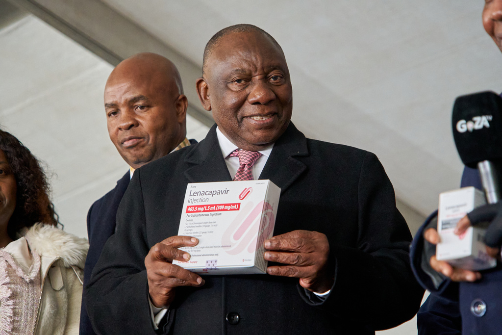 South African President, Cyril Ramaphosa holds a box of Lenacapavir during the official launch of the drug's rollout programme in Secunda, South Africa, Friday, June 5, 2026. (AP Photo/Kayleen Morgan)