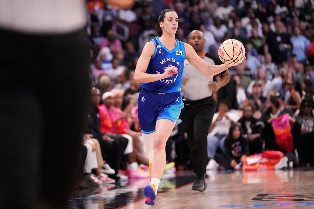 Team Spoon's Caitlin Clark looks to pass the ball during the first half of a WNBA All-Star basketball game against Team Coop in Chicago, Saturday, July 25, 2026. (AP Photo/Nam Y. Huh)