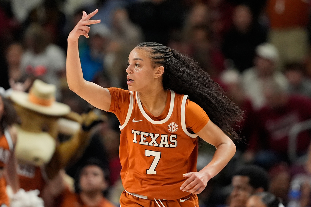 Texas guard Jordan Lee celebrates after scoring against South Carolina during the second half of an NCAA college basketball game in the final of the Southeastern Conference tournament, Sunday, March 8, 2026, in Greenville, S.C. (AP Photo/Chris Carlson)