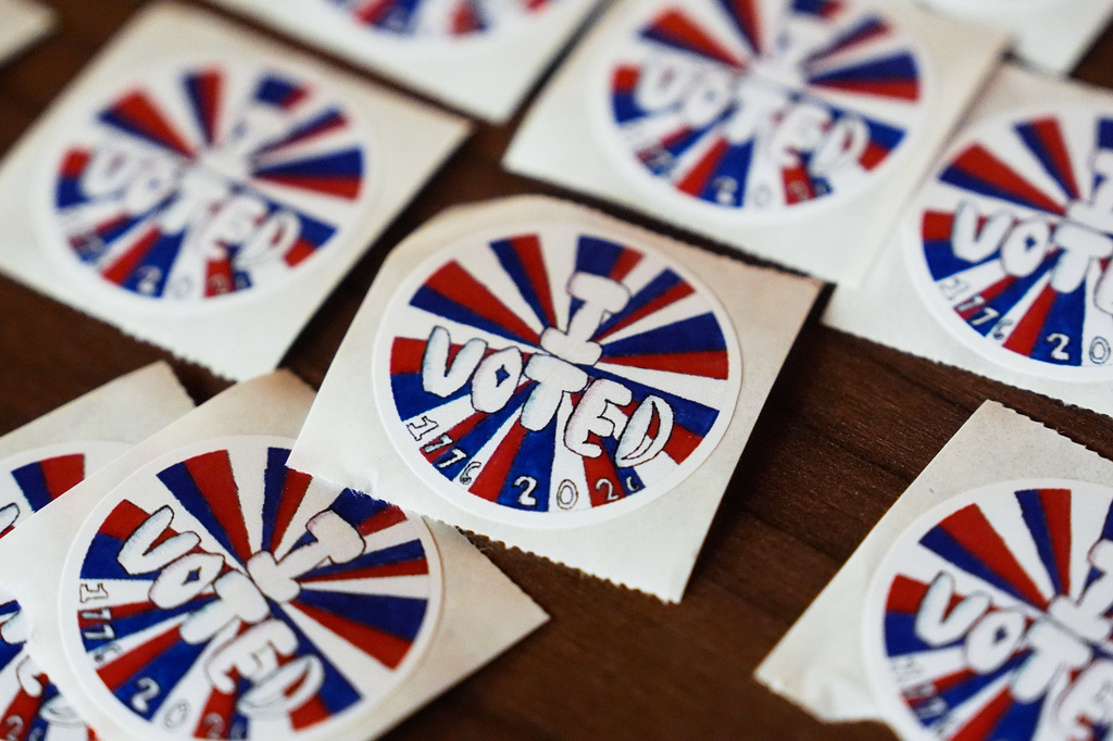 A close-up view of "I Voted" stickers on primary election day at the Baldwin Public Library Tuesday, Aug. 4, 2026, in Birmingham, Mich. (AP Photo/Paul Sancya)