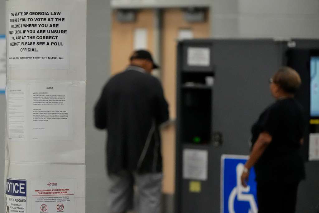 A man votes in a runoff election at the C.T. Martin Recreation Center, Tuesday, June 16, 2026, in Atlanta. (AP Photo/Mike Stewart)