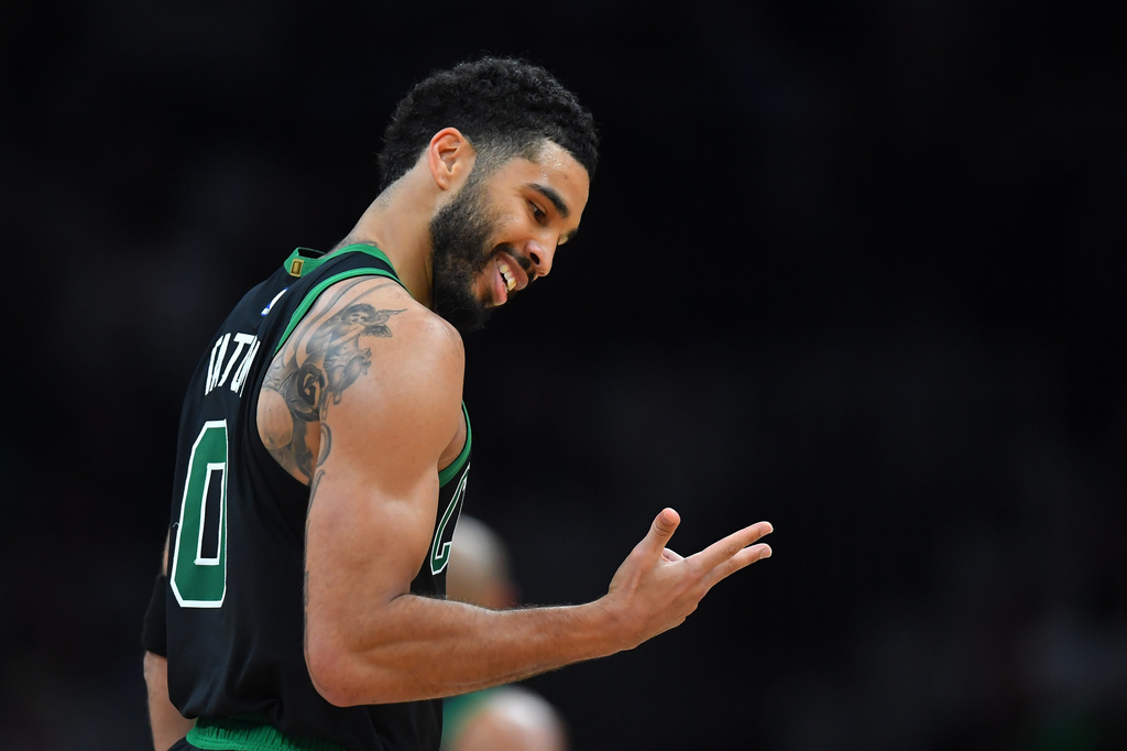 Boston Celtics forward Jayson Tatum celebrates after scoring in the first half of an NBA basketball game against the Toronto Raptors, Sunday, April 5, 2026, in Boston. (AP Photo/Steven Senne)