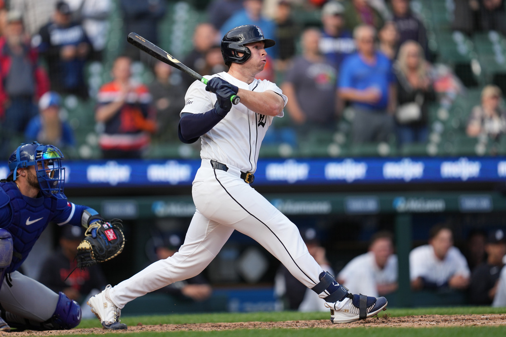 Detroit Tigers' Colt Keith hits a one-run single against the Kansas City Royals during the ninth inning of a baseball game Thursday, April 16, 2026, in Detroit. (AP Photo/Paul Sancya)