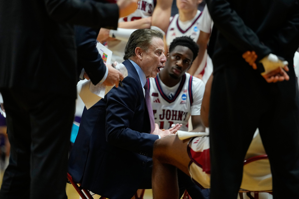 St. John's head coach Rick Pitino talks with the team while playing Northern Iowa during the second half in the first round of the NCAA college basketball tournament Friday, March 20, 2026, in San Diego. (AP Photo/Mark J. Terrill)
