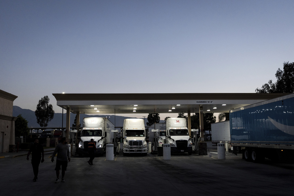 Trucks refuel at a gas station in Fontana, Calif., Wednesday, Sept. 3, 2025. (AP Photo/Jae C. Hong)