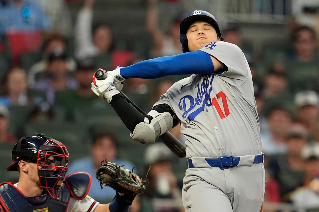 Los Angeles Dodgers two-way player Shohei Ohtani (17) strikes out during the fourth inning in Game 4 of baseball's National League Division Series against the Atlanta Braves, Wednesday, Oct. 7, 2026, in Atlanta. (AP Photo/Mike Stewart)