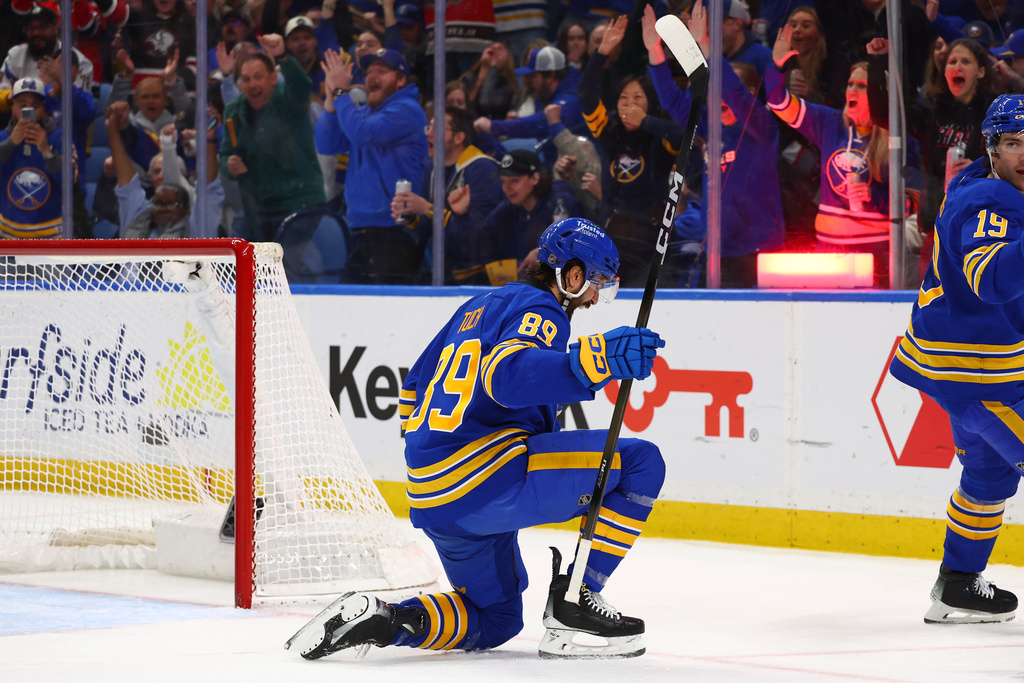 Buffalo Sabres right wing Alex Tuch (89) celebrates his goal during the first period of an NHL hockey game against the San Jose Sharks, Tuesday, March 10, 2026, in Buffalo, N.Y. (AP Photo/Jeffrey T. Barnes)