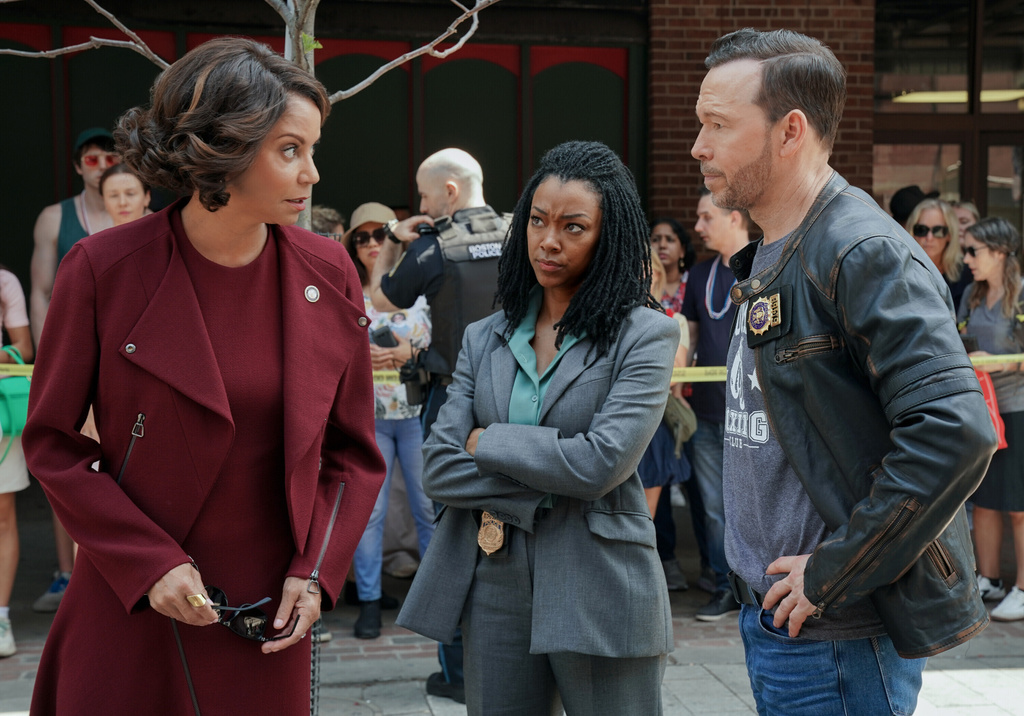 This image released by CBS shows Bridget Moynahan, from left, Sonequa Martin-Green, and Donnie Wahlberg in a scene from "Boston Blue." (John Medland/CBS via AP)
