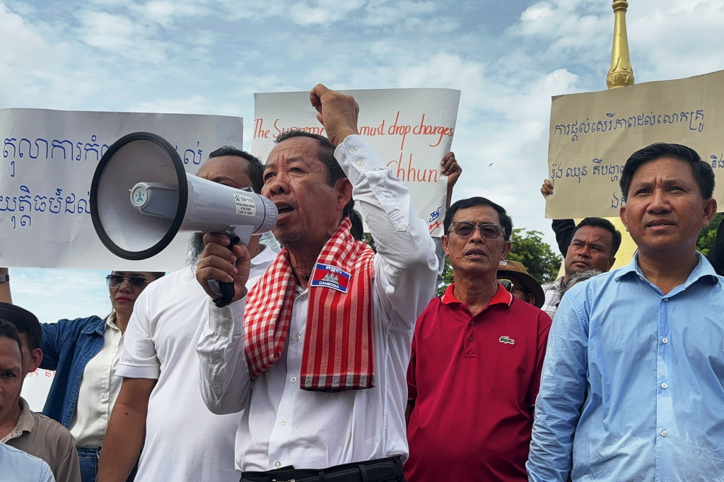 Rong Chhun, a top adviser to the Nation Power Party and a prominent opposition politician, speaks to supporters outside Cambodia's Supreme Court in Phnom Penh, Friday, June 19, 2026. (AP Photo/Sopheng Cheang)