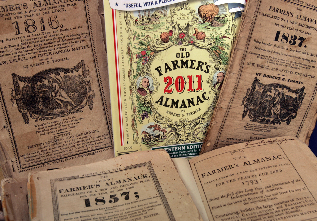 FILE - The latest edition of the Old Farmer's Almanac is mixed in with older editions, Sept. 1, 2010, in Dublin, N.H. (AP Photo/Jim Cole)