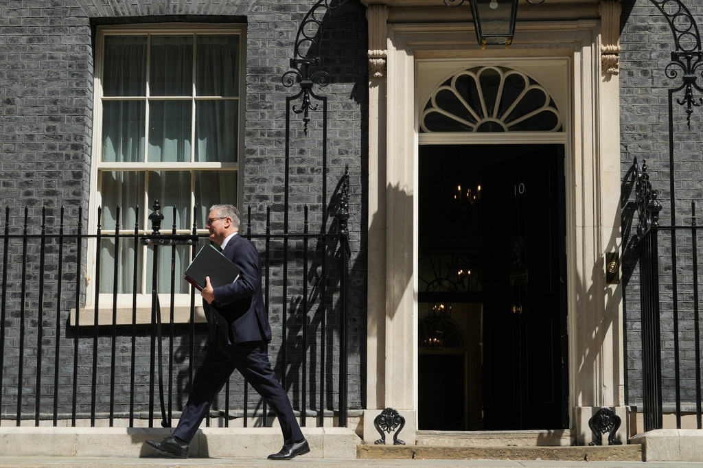 Britain's Prime Minister Keir Starmer departs 10 Downing Street to attend the House of Commons for his weekly Prime Minister's Questions in London, Wednesday, June 24, 2026. (AP Photo/Alastair Grant)