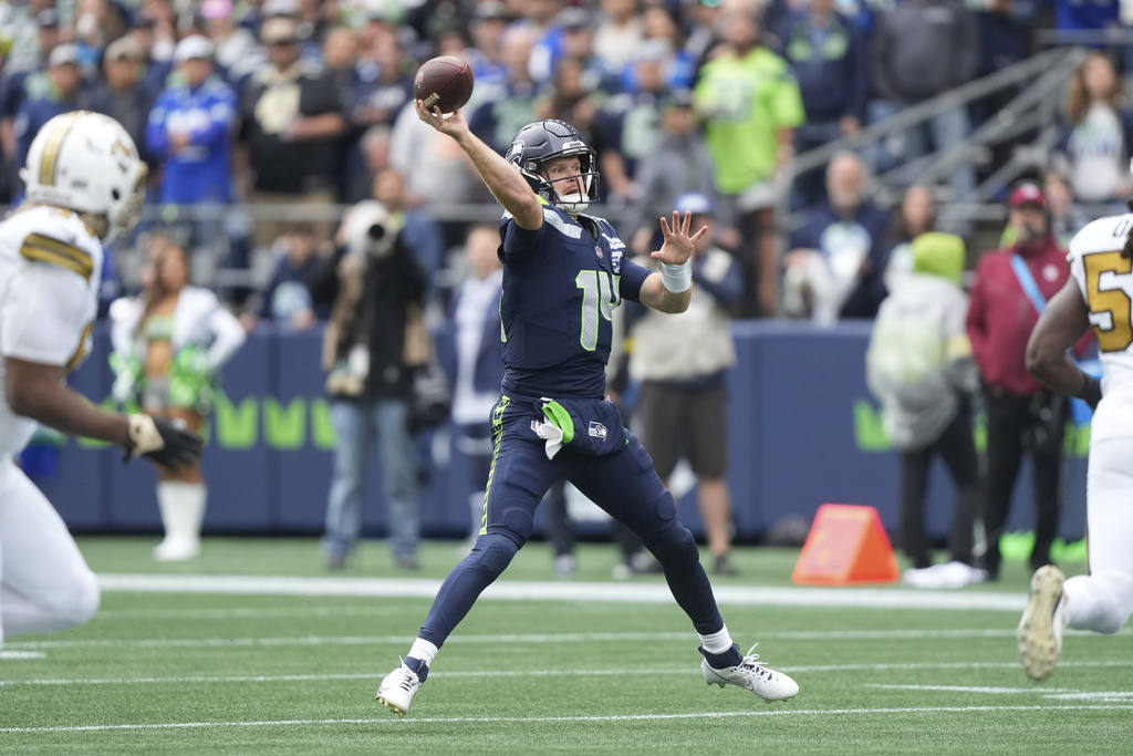Seattle Seahawks quarterback Sam Darnold (14) passes during the first half of an NFL football game against the New Orleans Saints, Sunday, Sept. 21, 2025, in Seattle. (AP Photo/Stephen Brashear)