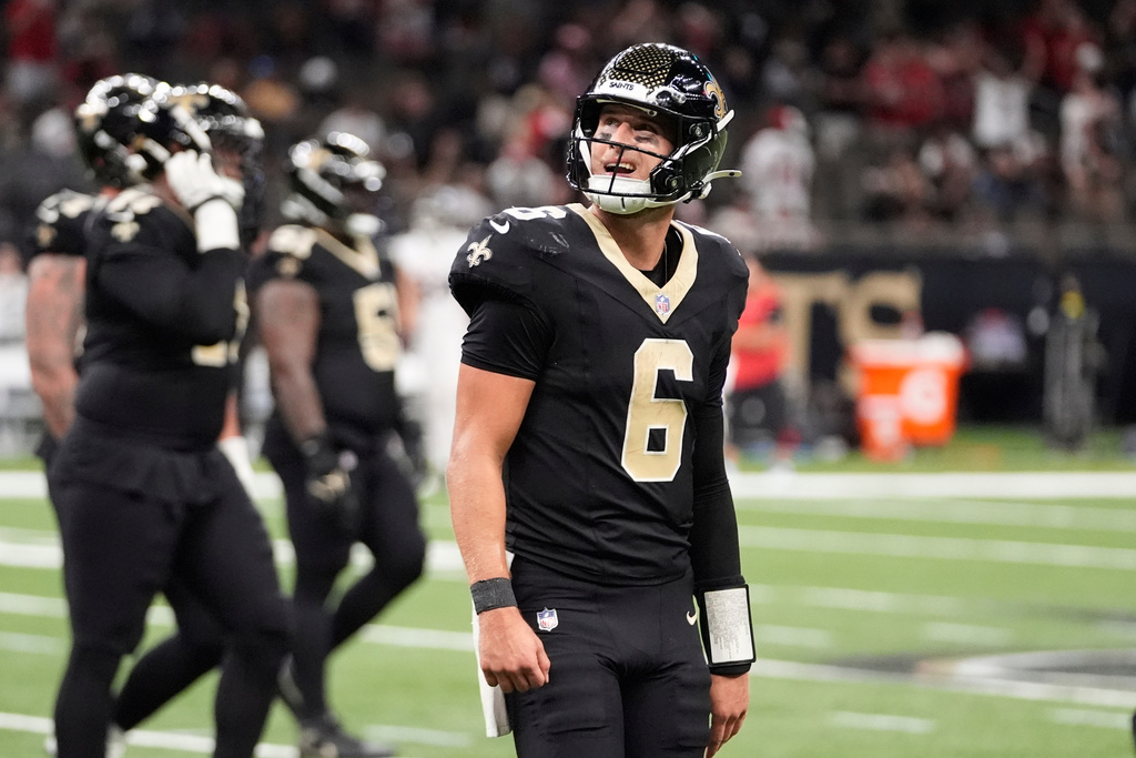 New Orleans Saints quarterback Tyler Shough (6) walks off the field after throwing an interception against the Atlanta Falcons in the second half of an NFL football game, Sunday, Nov. 23, 2025, in New Orleans. (AP Photo/Gerald Herbert)