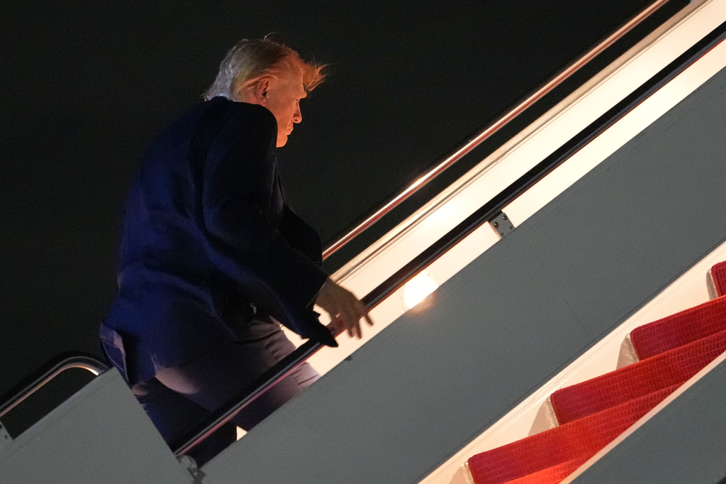 President Donald Trump boards Air Force One, Monday, June 15, 2026, at Joint Base Andrews, Md. (AP Photo/Julia Demaree Nikhinson)