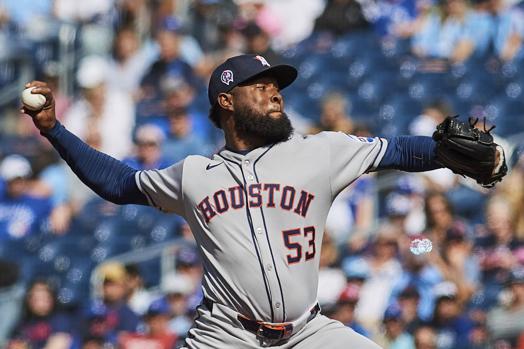 Houston Astros pitcher Cristian Javier (53) works against the Toronto Blue Jays during the first inning of a baseball game in Toronto, Thursday, Sept. 11, 2025. (Sammy Kogan/The Canadian Press via AP)