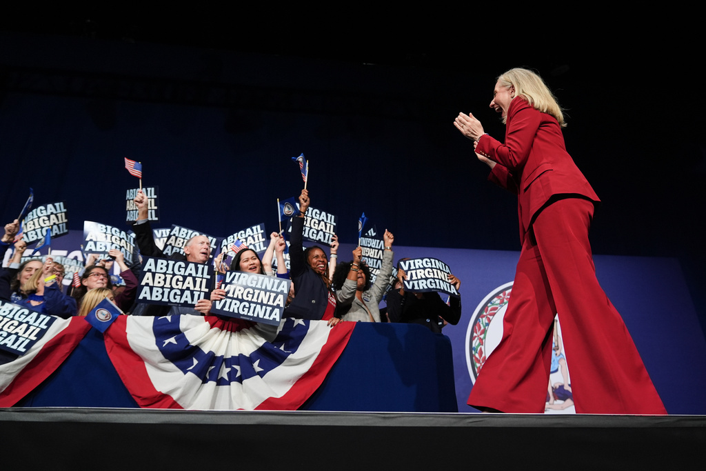 Democrat Abigail Spanberger walks out on stage after she was declared the winner of the Virginia governor's race during an election night watch party Tuesday, Nov. 4, 2025, in Richmond, Va. (AP Photo/Stephanie Scarbrough)