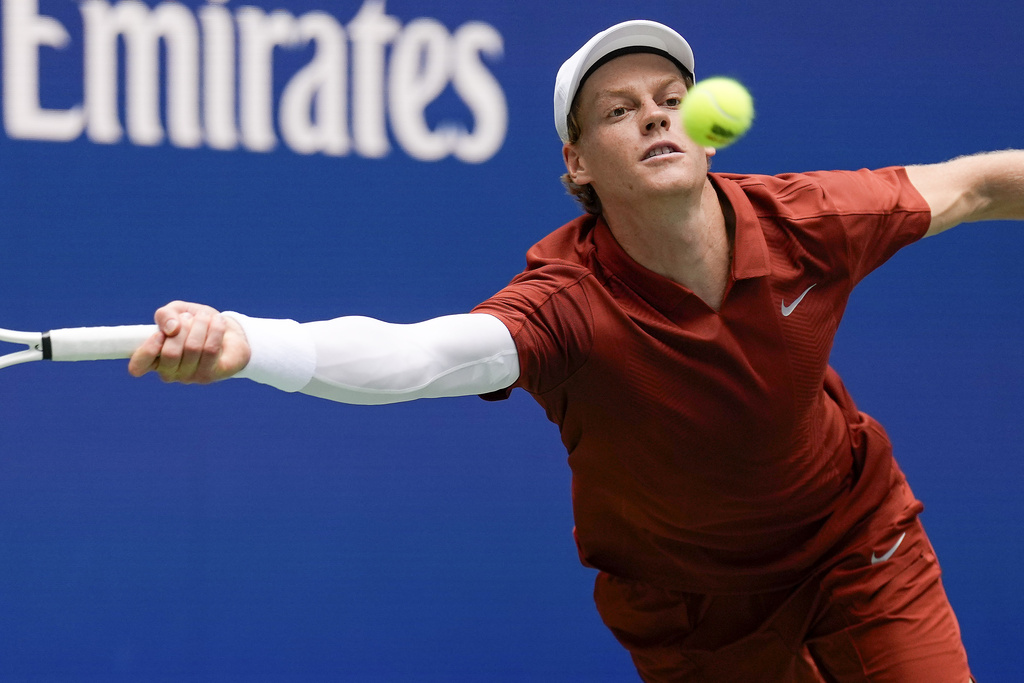 Jannik Sinner, of Italy, returns a shot to Alexei Popyrin, of Australia, during the second round of the U.S. Open tennis championships, Thursday, Aug. 28, 2025, in New York. (AP Photo/Seth Wenig)