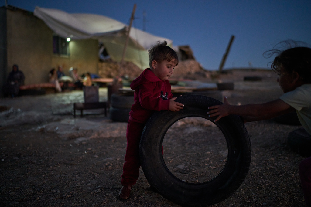 Palestinian children play outside their houses in a community near the West Bank village of Susya, in the Masafer Yatta region, Wednesday, June 17, 2026.(AP Photo/Leo Correa)
